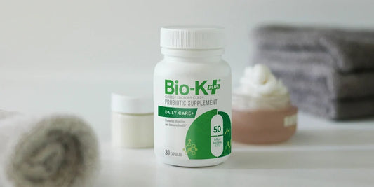  Bio-K+ probiotic capsule bottle with strain and CFU information displayed on a clean countertop