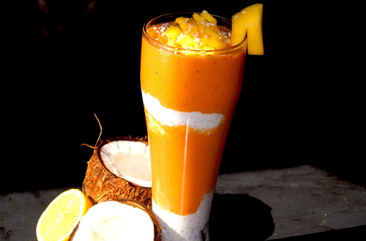 Mango and goji berry smoothie parfait with chia seeds and coconut